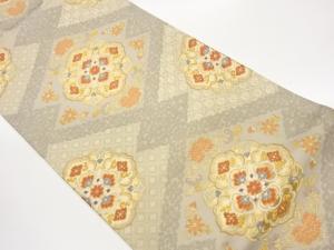 変わり松皮菱に華文・草花模様織出し袋帯